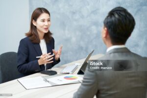 business woman giving a presentation in the office